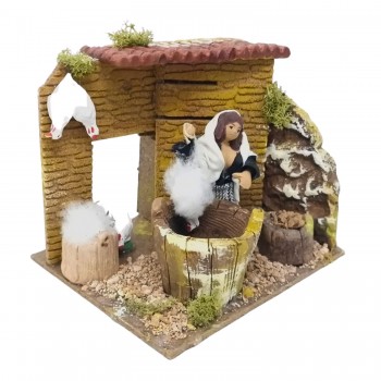 Donna che Spenna Galline Pastore per Presepe in Movimento 17x17 cm