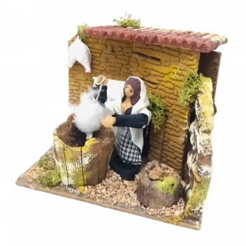 Donna che Spenna Galline Pastore per Presepe in Movimento 17x17 cm