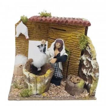 Donna che Spenna Galline Pastore per Presepe in Movimento 17x17 cm