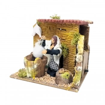 Donna che Spenna Galline Pastore per Presepe in Movimento 17x17 cm