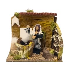 Donna che Spenna Galline Pastore per Presepe in Movimento 17x17 cm