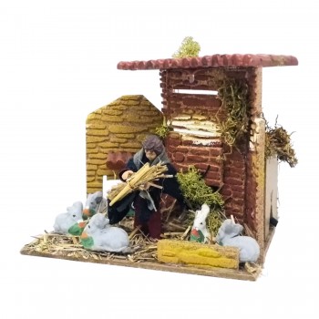 Bambino con Conigli Pastore per Presepe in Movimento 17x17 cm