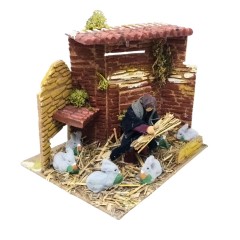 Bambino con Conigli Pastore per Presepe in Movimento 17x17 cm