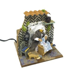 Donna che Cuce Pastore per Presepe in Movimento 17x17 cm 79218