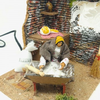 Donna che Impasta il Pane Statuina per Presepe in Movimento 17x17 cm 79217