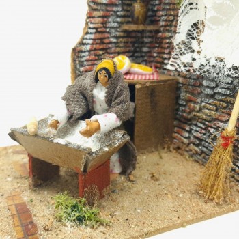 Donna che Impasta il Pane Statuina per Presepe in Movimento 17x17 cm 79217