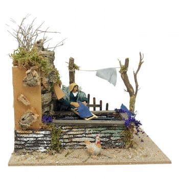 Lavandaia con Fontana Pastore per Presepe in Movimento 17x17 cm 79208