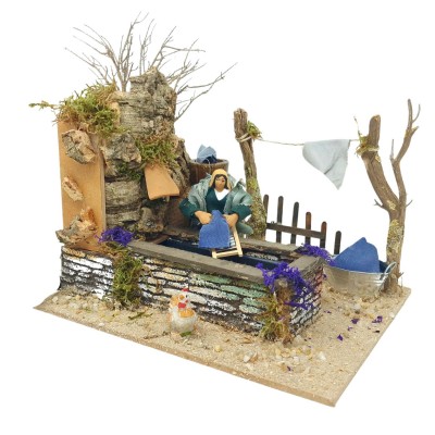 Lavandaia con Fontana Pastore per Presepe in Movimento 17x17 cm 79208