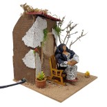 Donna che Legge Pastore per Presepe in Movimento 17x17 cm