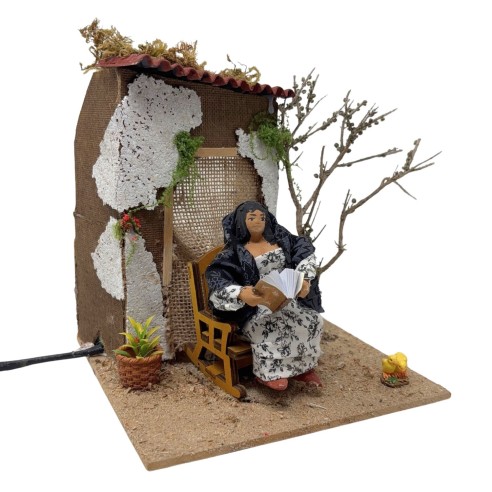 Donna che Legge Pastore per Presepe in Movimento 17x17 cm