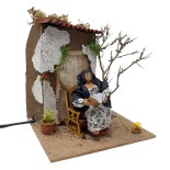 Donna che Legge Pastore per Presepe in Movimento 17x17 cm