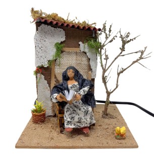 Donna che Legge Pastore per Presepe in Movimento 17x17 cm
