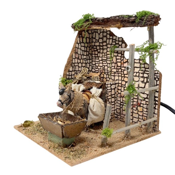 Asino che Mangia Animali per Presepe in Movimento 17x17 cm