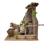 Asino che Mangia Animali per Presepe in Movimento 17x17 cm