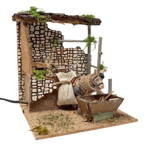 Asino che Mangia Animali per Presepe in Movimento 17x17 cm