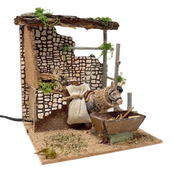 Asino che Mangia Animali per Presepe in Movimento 17x17 cm