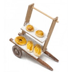 Miniatura di un carretto a due piani con pane